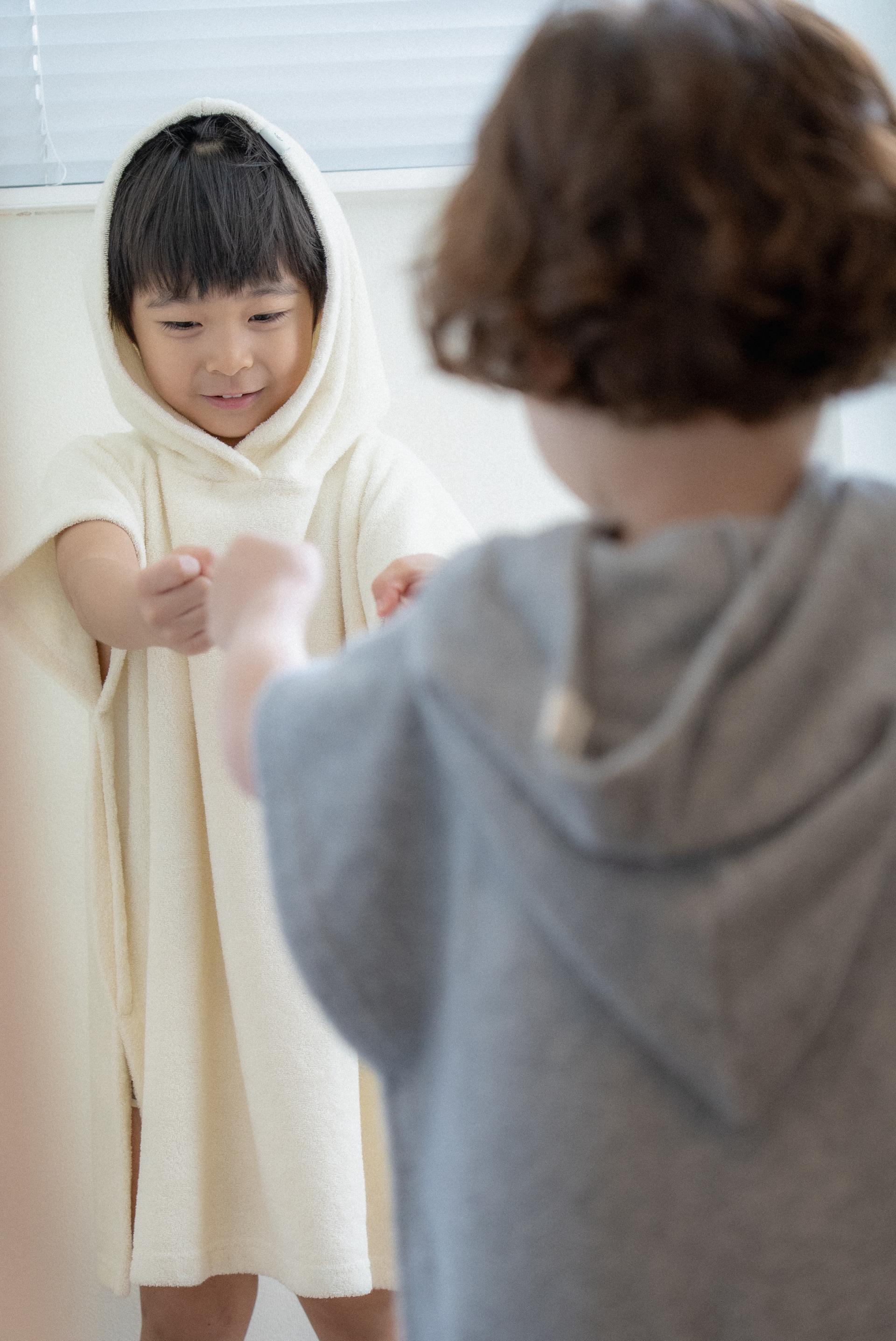 dánda cone poncho (단다 콘 판초)