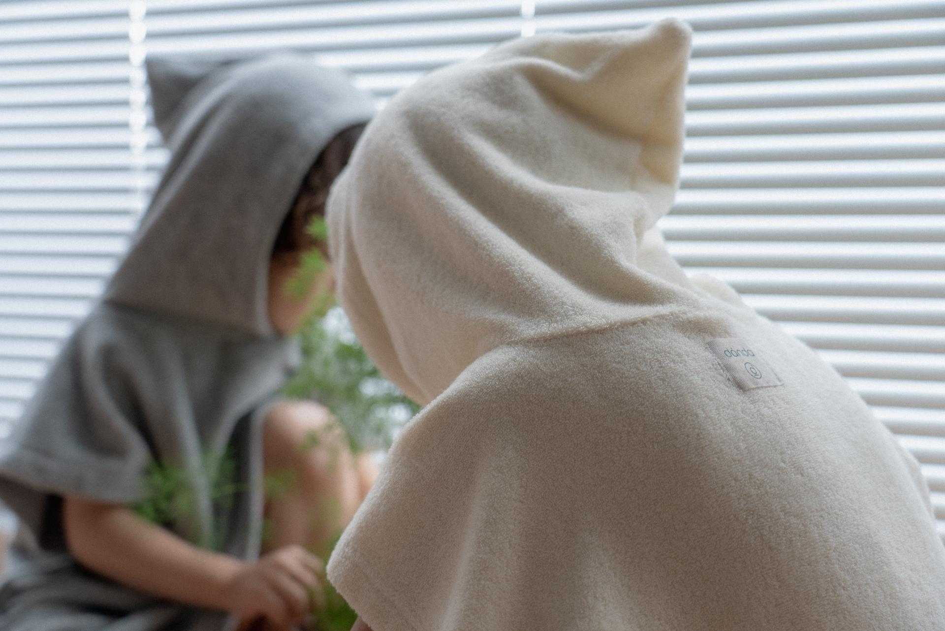 dánda cone poncho (단다 콘 판초)