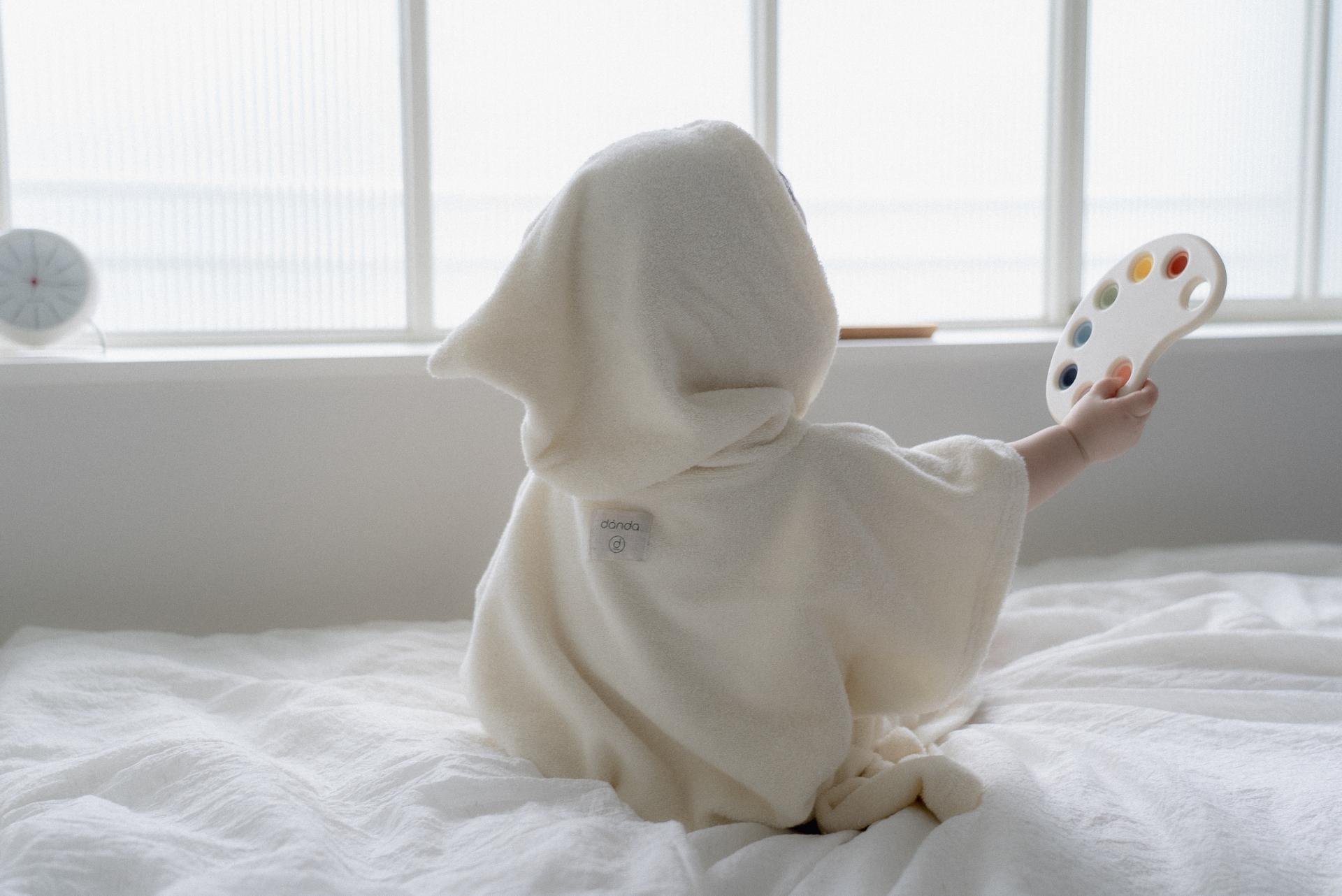 dánda cone poncho (단다 콘 판초)