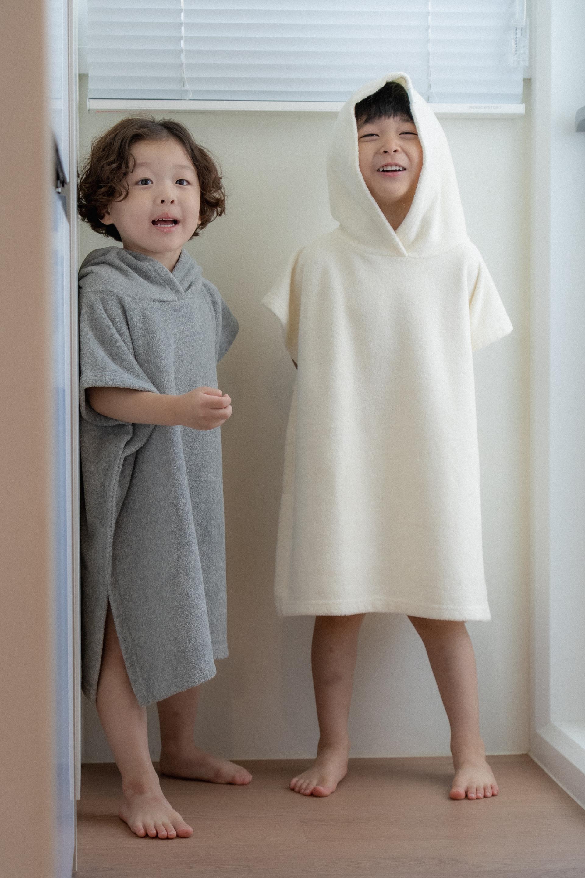 dánda cone poncho (단다 콘 판초)