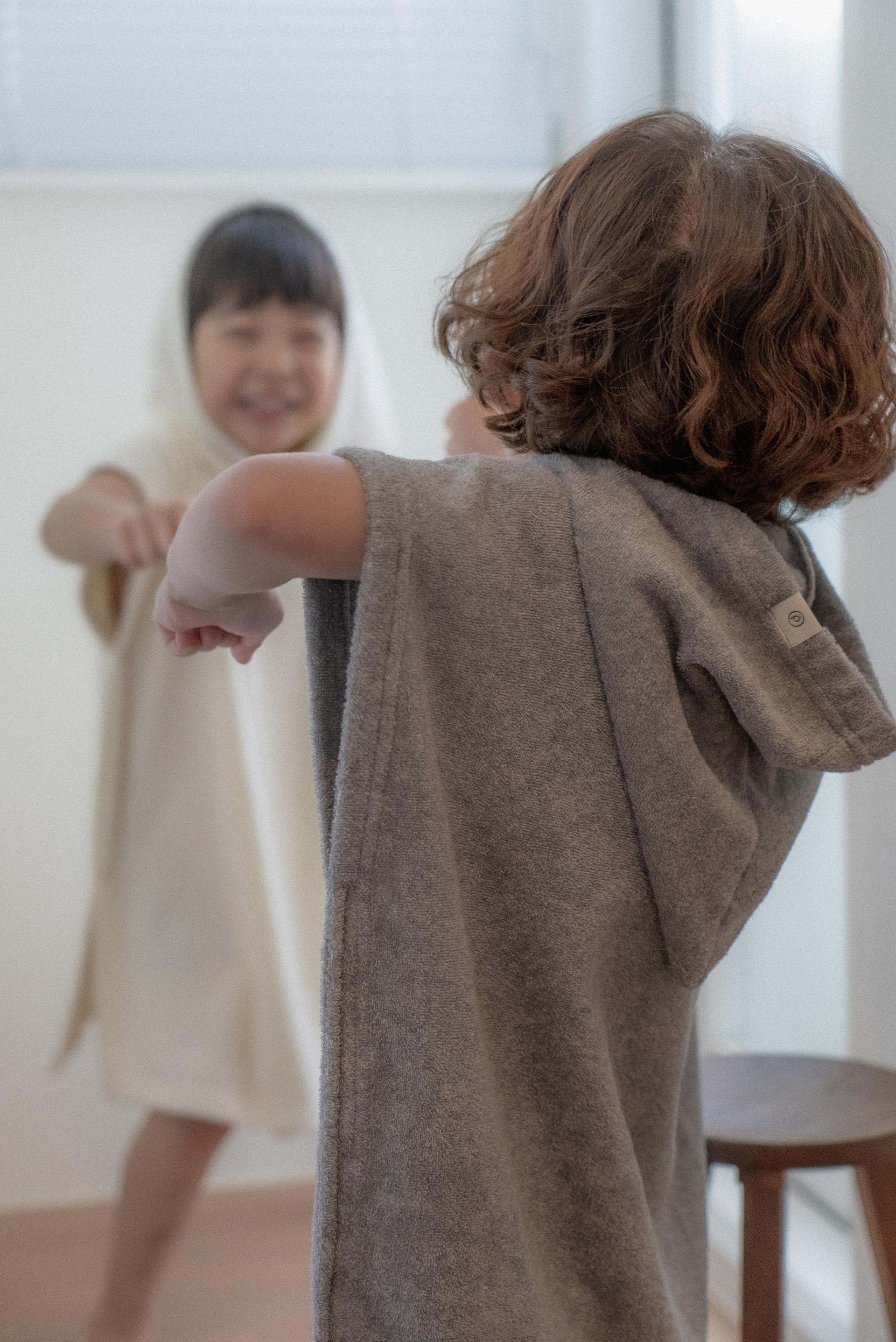 dánda cone poncho (단다 콘 판초)