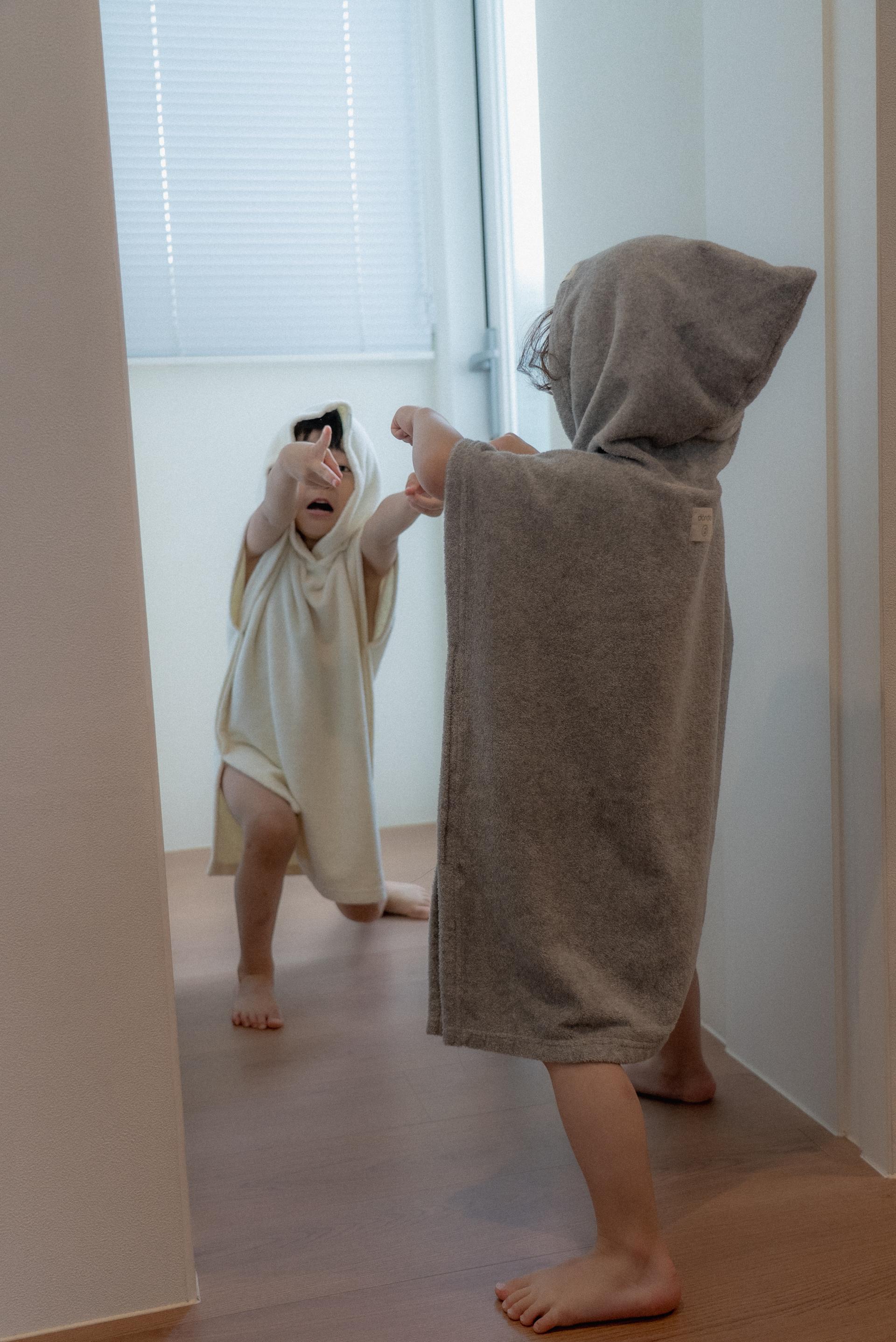 dánda cone poncho (단다 콘 판초)