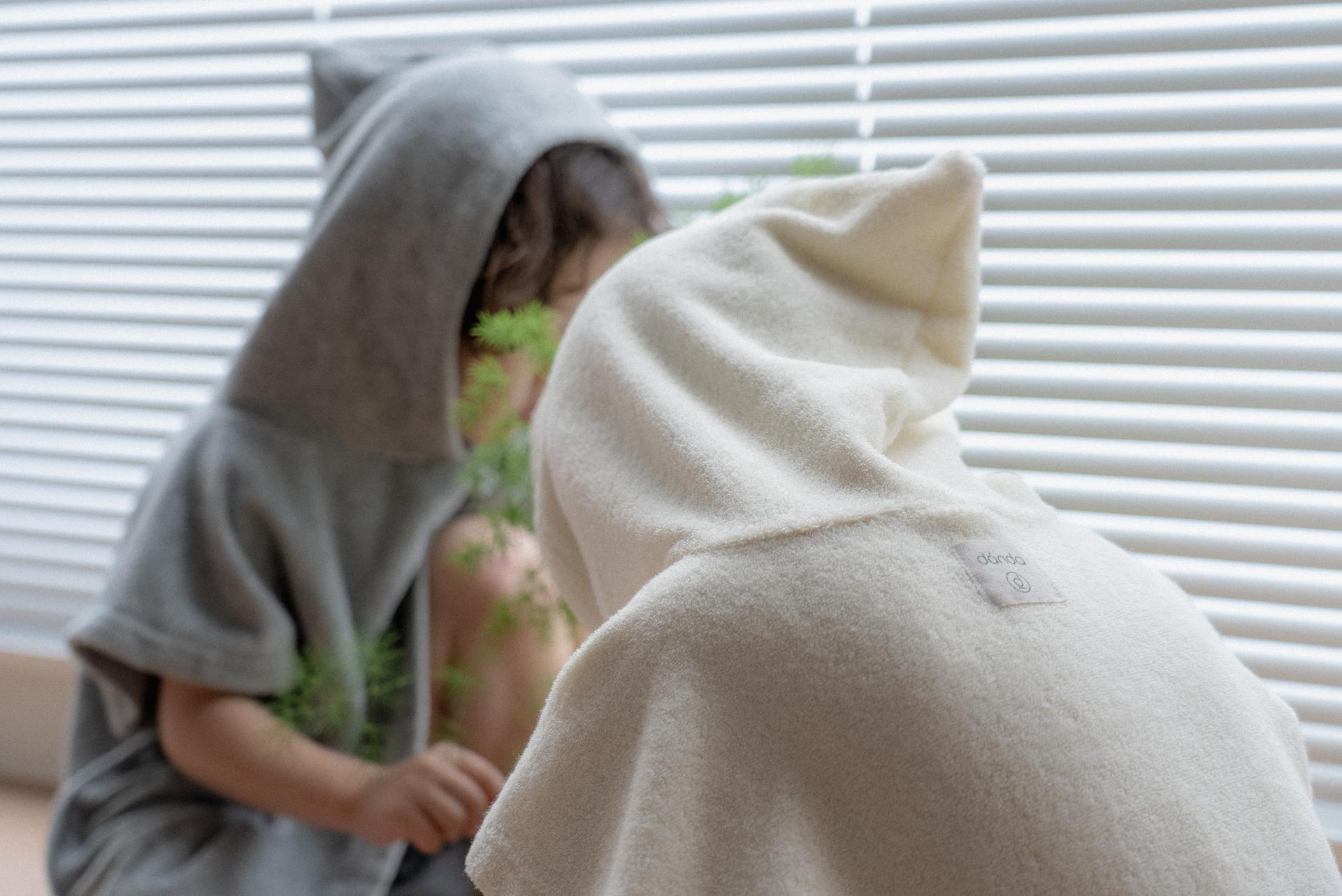 dánda cone poncho (단다 콘 판초)